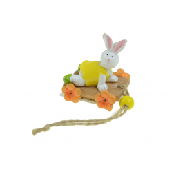 Figura nyuszi fiú poly 4,2*3,7*4,7cm kocsin narancs